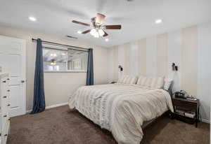 Carpeted bedroom with baseboards, recessed lighting, and ceiling fan