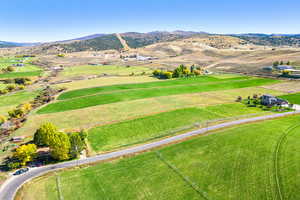 Aerial view with a mountain view and a rural view