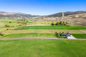 Birds eye view of property featuring a rural view and a mountain view
