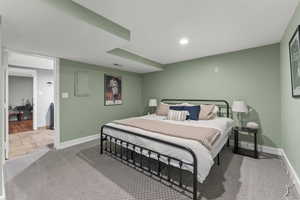 Bedroom featuring carpet floors, baseboards, visible vents, and recessed lighting