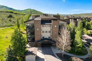 View of property with a mountain view
