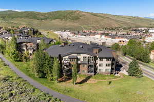 Aerial view of residential area featuring a mountain backdrop