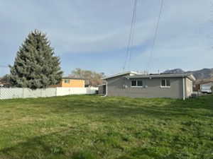 View of yard with fence