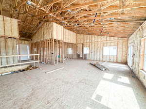 Miscellaneous room with lofted ceiling