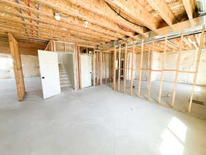 Unfinished basement with stairs