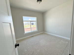 Spare room with baseboards