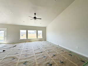 Spare room with ceiling fan and a textured ceiling