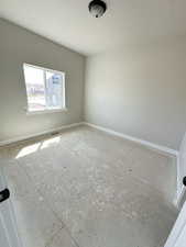 Empty room with baseboards