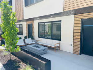 View of patio / terrace featuring an outdoor fire pit