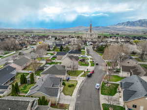 Drone / aerial view with a mountain view and a residential view
