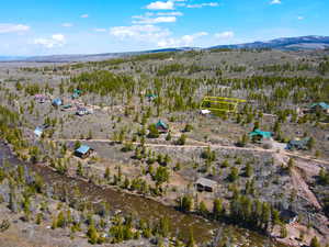 Drone / aerial view featuring a mountain view and a rural view
