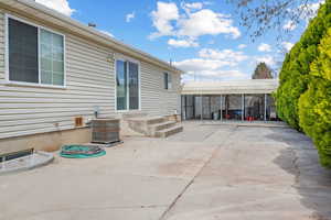 View of patio with cooling unit