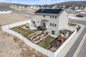 Birds eye view of property with a residential view