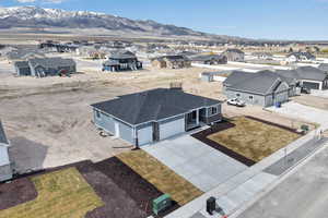 Aerial view featuring a mountain view and a residential view