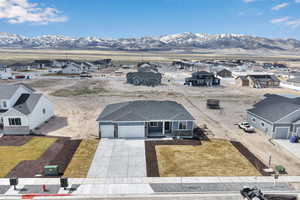 Aerial view featuring a mountain view and a residential view