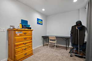 Carpeted office featuring recessed lighting and baseboards