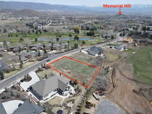 Aerial view featuring golf course view, a residential view, and a water view