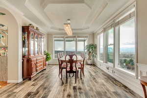 Sunroom with arched walkways and visible vents