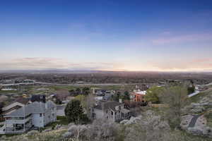 Aerial view at dusk featuring a residential view