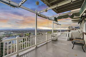 Patio terrace at dusk with grilling area