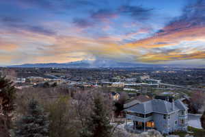 Birds eye view of property with a mountain view