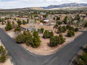Aerial view featuring a mountain view and a residential view
