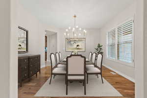 Large, virtually staged dining room