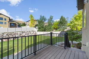 Deck overlooking backyard