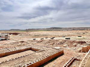View of yard featuring a rural view and a mountain view