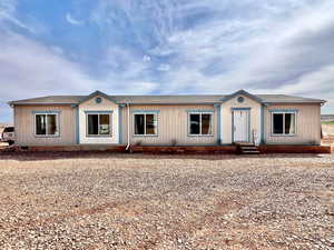 View of front of property featuring crawl space