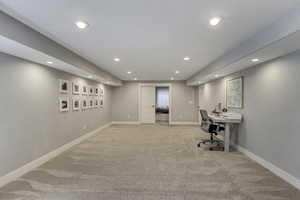 Home office featuring light carpet, recessed lighting, and baseboards