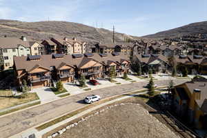 Drone / aerial view featuring a residential view and a mountain view