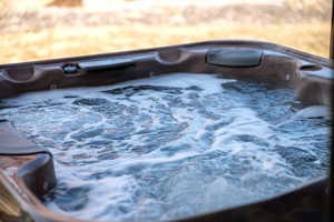 Exterior details with a sink and a jacuzzi