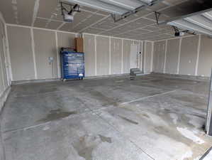 3 Car Garage with a garage door openers