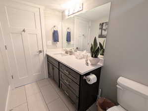 Bathroom with toilet and vanity