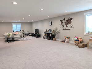 Playroom featuring recessed lighting, carpet flooring, and plenty of natural light