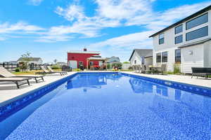 View of 20x40 vinyl sports liner salt water pool, a gazebo, a patio, and a fenced backyard