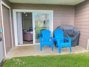 View of patio featuring area for grilling