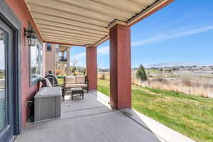 View of patio / terrace featuring a mountain view and an outdoor hangout area