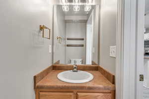Bathroom with toilet and vanity