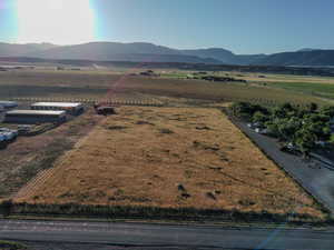 View of mountain background featuring rural landscape and extensive farmland