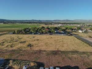 Overview of rural landscape featuring a mountain backdrop