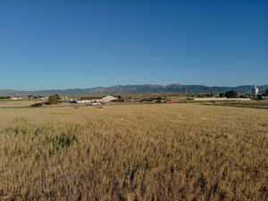 View of mountain background featuring rural landscape