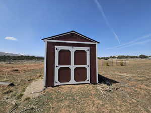 Small shed included!