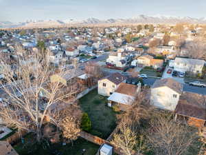 Drone / aerial view with a mountain view and a residential view