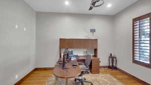 Office area with recessed lighting, light wood finished floors, and baseboards