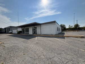View of front of property featuring uncovered parking