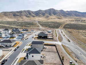 Birds eye view of property featuring a mountain view and a residential view