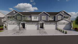 View of front facade with board and batten siding, driveway, a garage, and stone siding