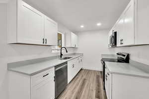 Beautiful kitchen with stainless appliances and quartz countertops